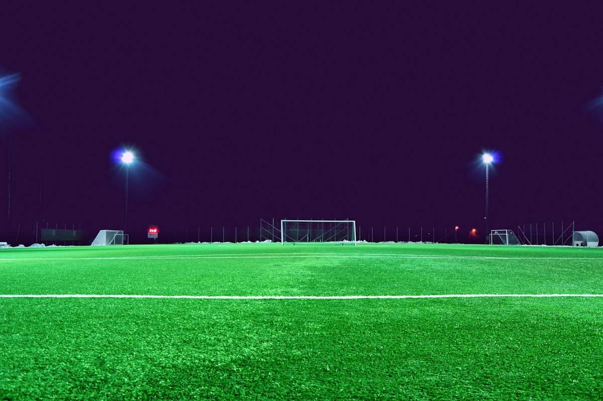8-a-side football match under the floodlights
